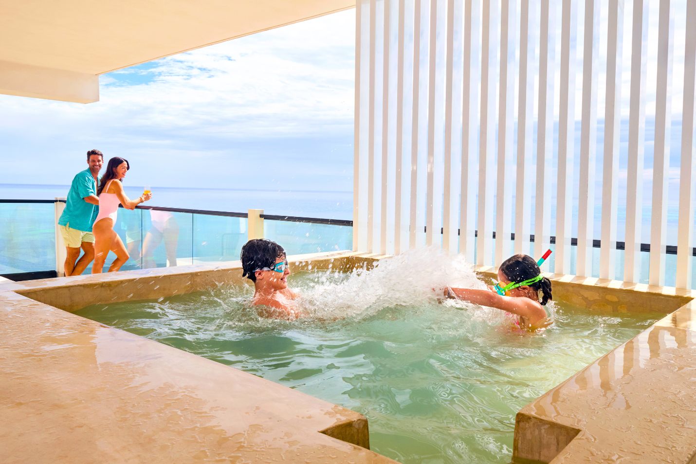 a group of kids in a hot tub