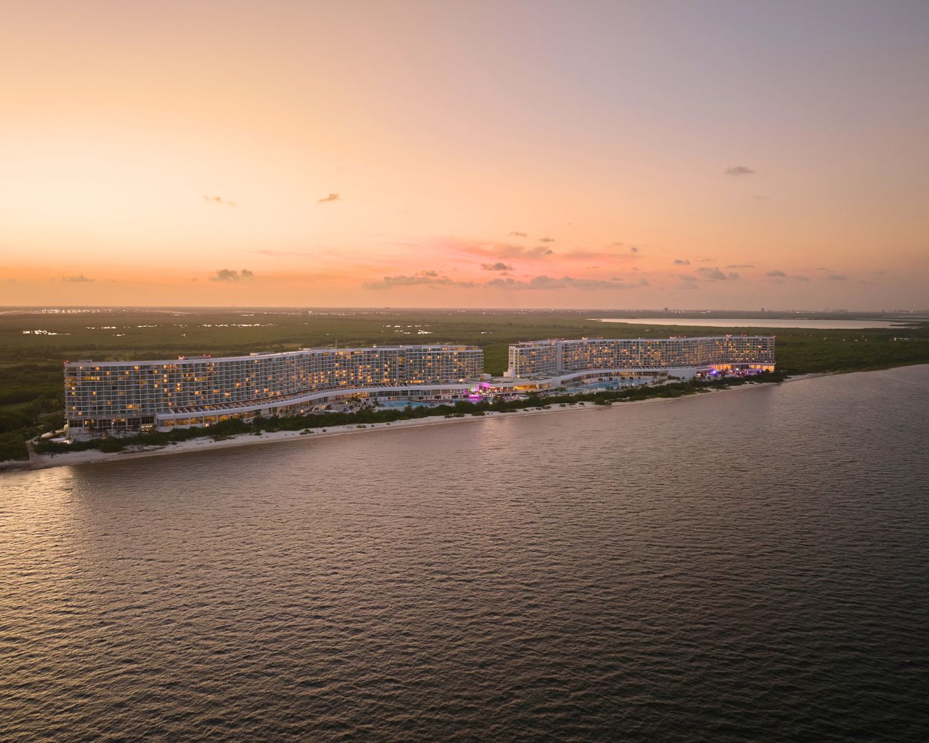 a large building next to a body of water